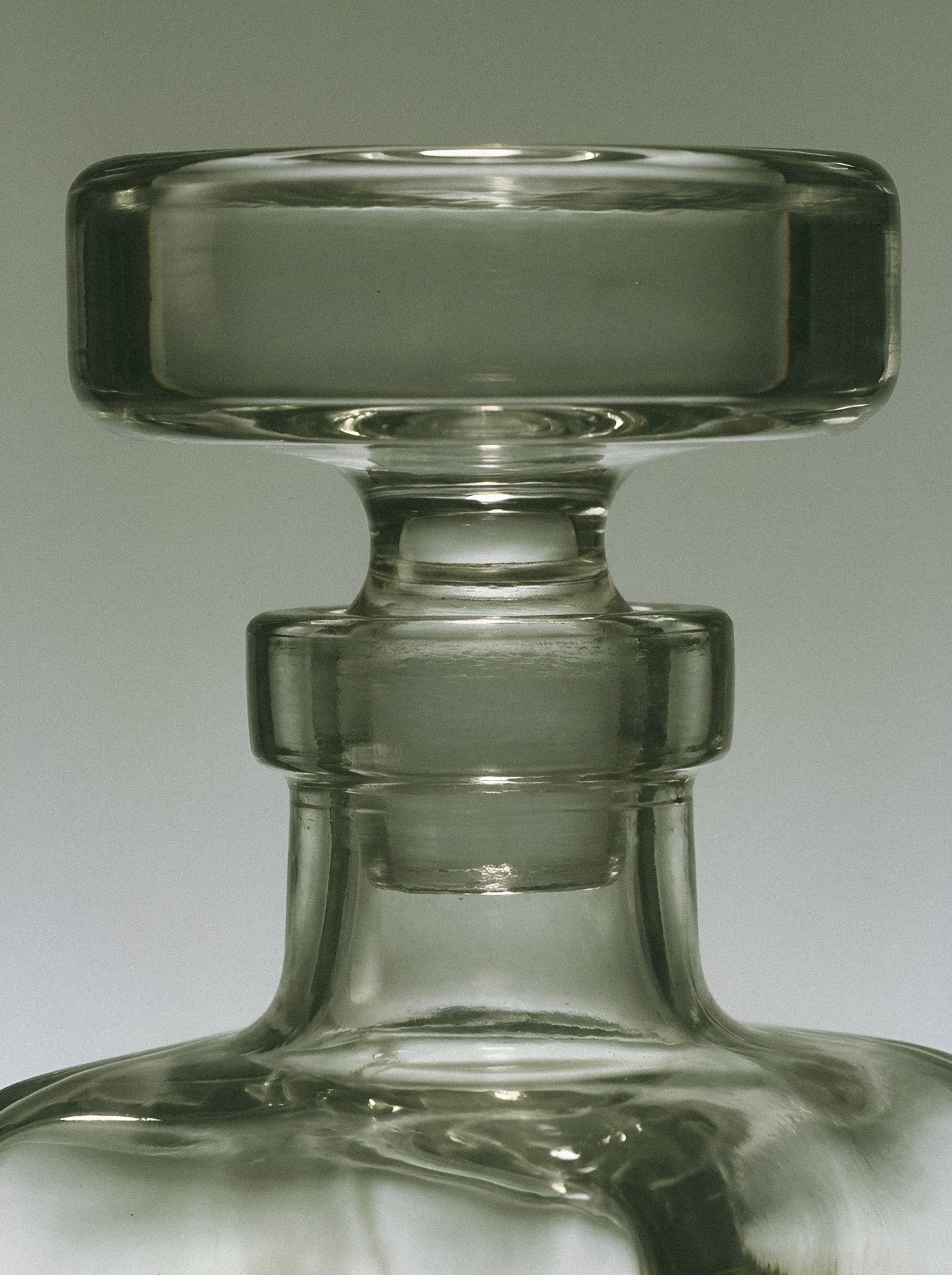 Glass vessel with rounded rim.