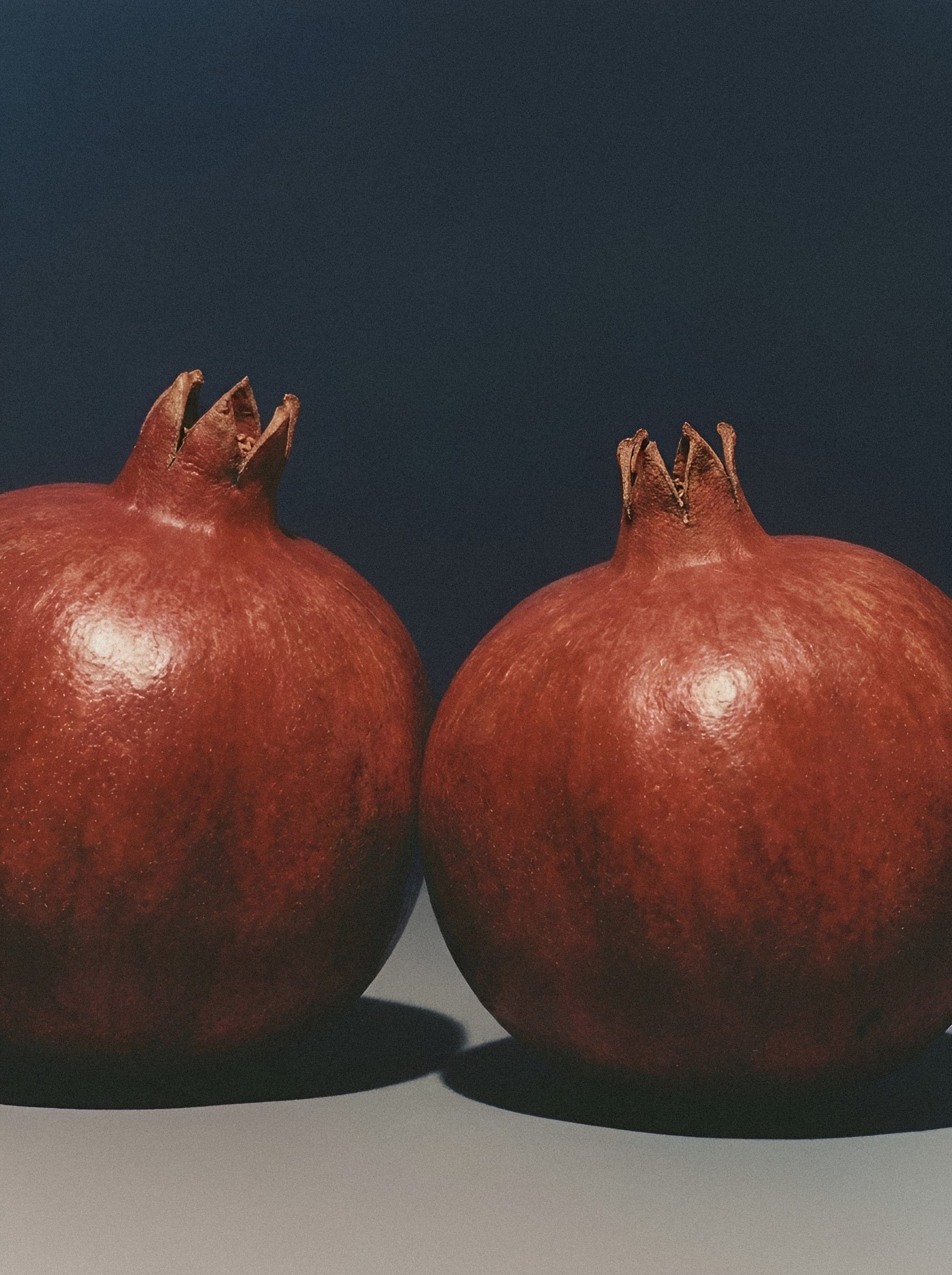 Pomegranates with crown sepals.