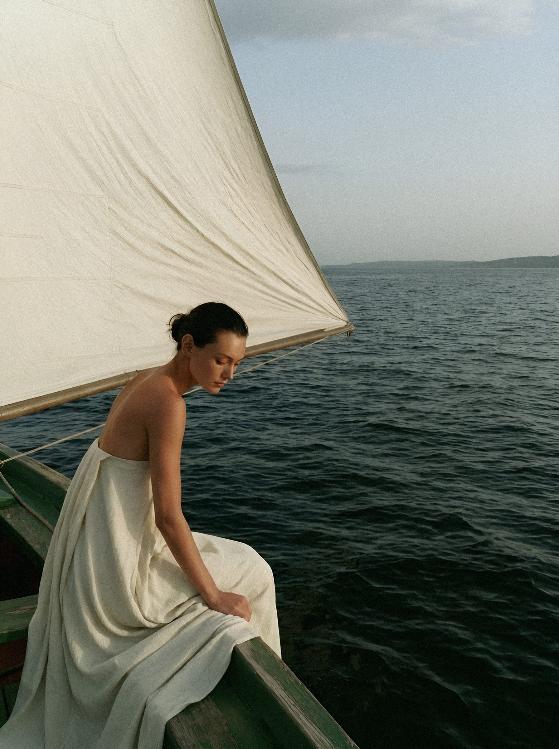 Woman at sail s edge.
